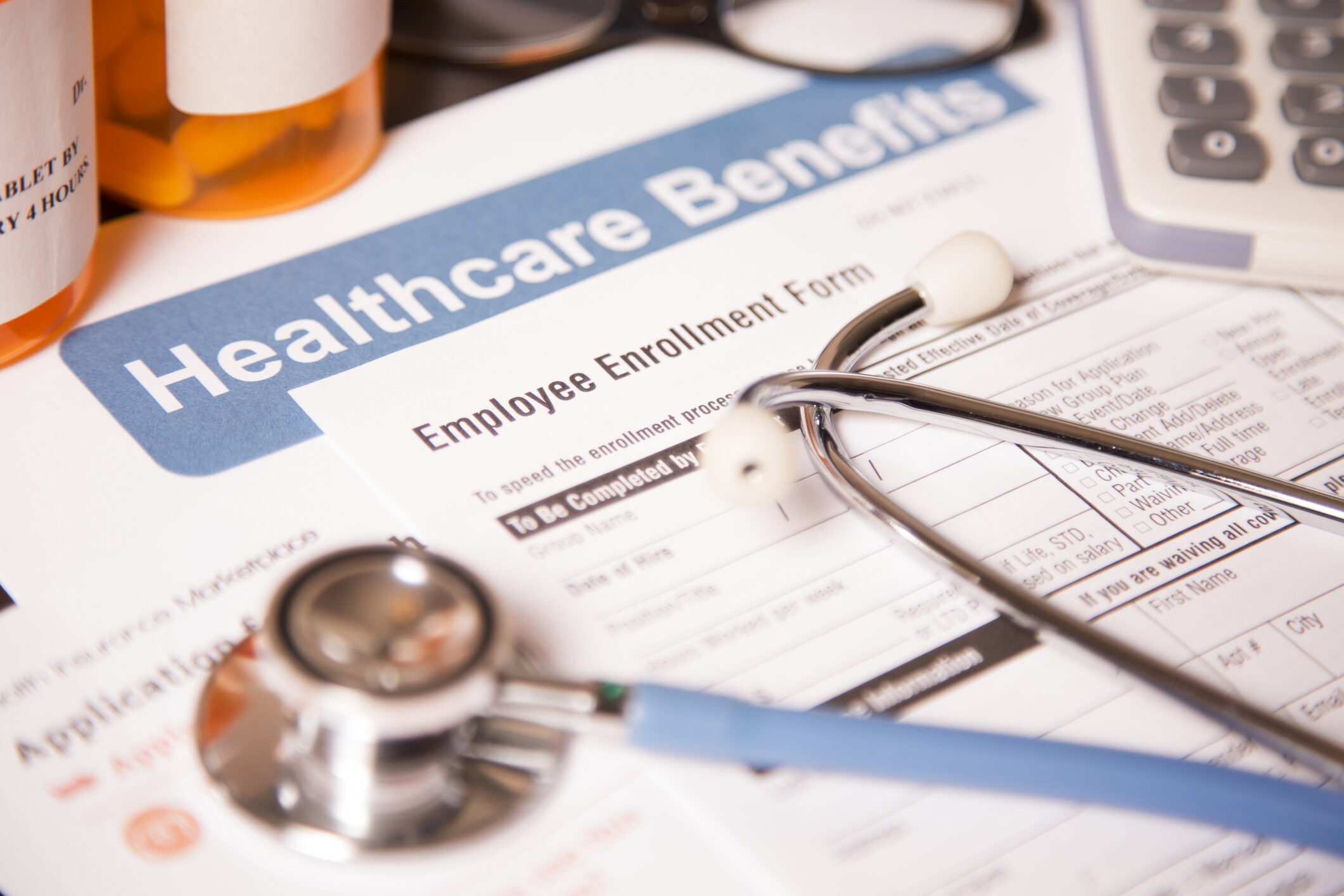 Open enrollment healthcare benefit forms.