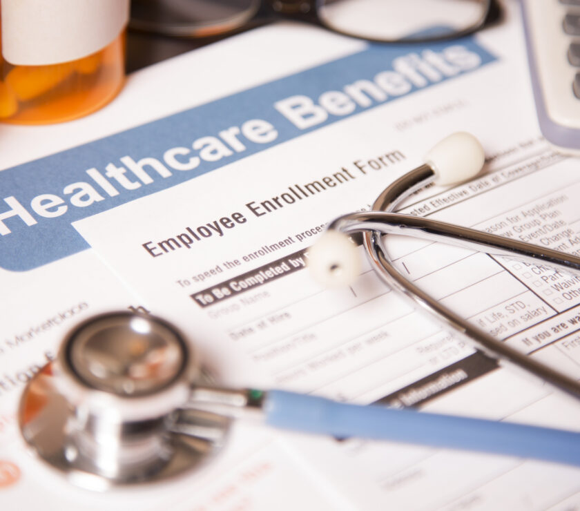 Open enrollment healthcare benefit forms.